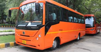Signature Neon Orange Luxury Tourist Microcoach Sheena 21-27 Seater AC Bus Rental Delhi - Ajay Travels