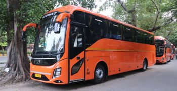 Signature Neon Orange Volvo 9600 Luxury Multi-Axle Tourist Bus Hire in Delhi - Ajay Travels